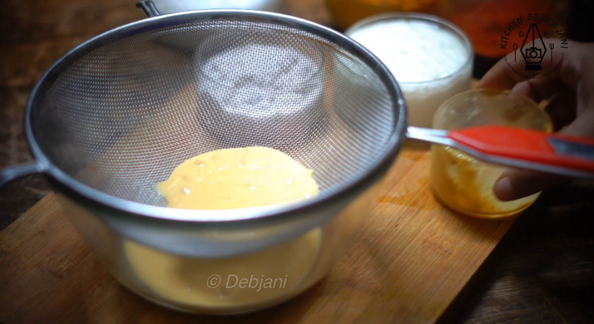 %straining mustard paste for bhapa bhetki Debjanir Rannaghar