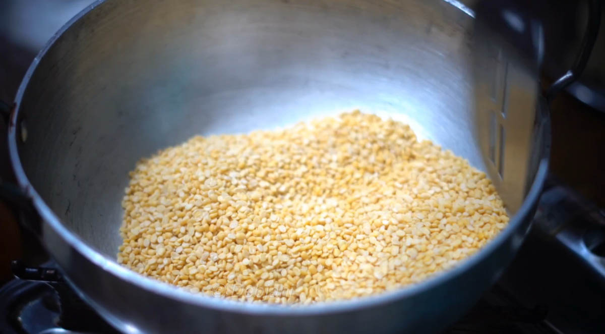 %Niramish Khichuri Cooking process step 1 - Roasing Moong Dal