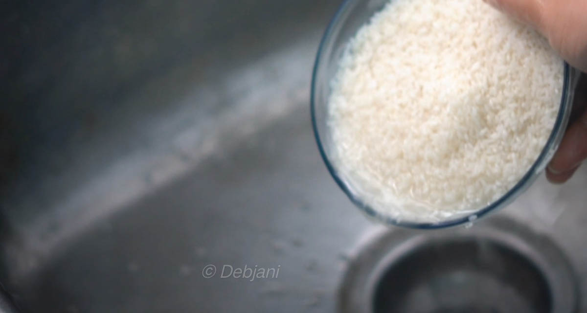 Niramish Khichuri Cooking process step 3 - Washing Gobindobhog Rice