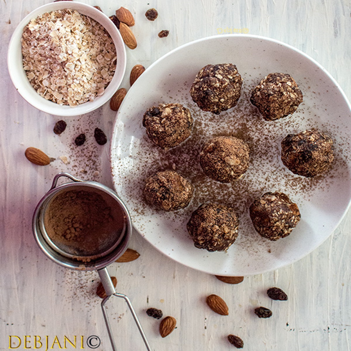 %Oatmeal, Almond, Raisin, Date and Chocolate Energy Balls recipe Debjanir Rannaghar