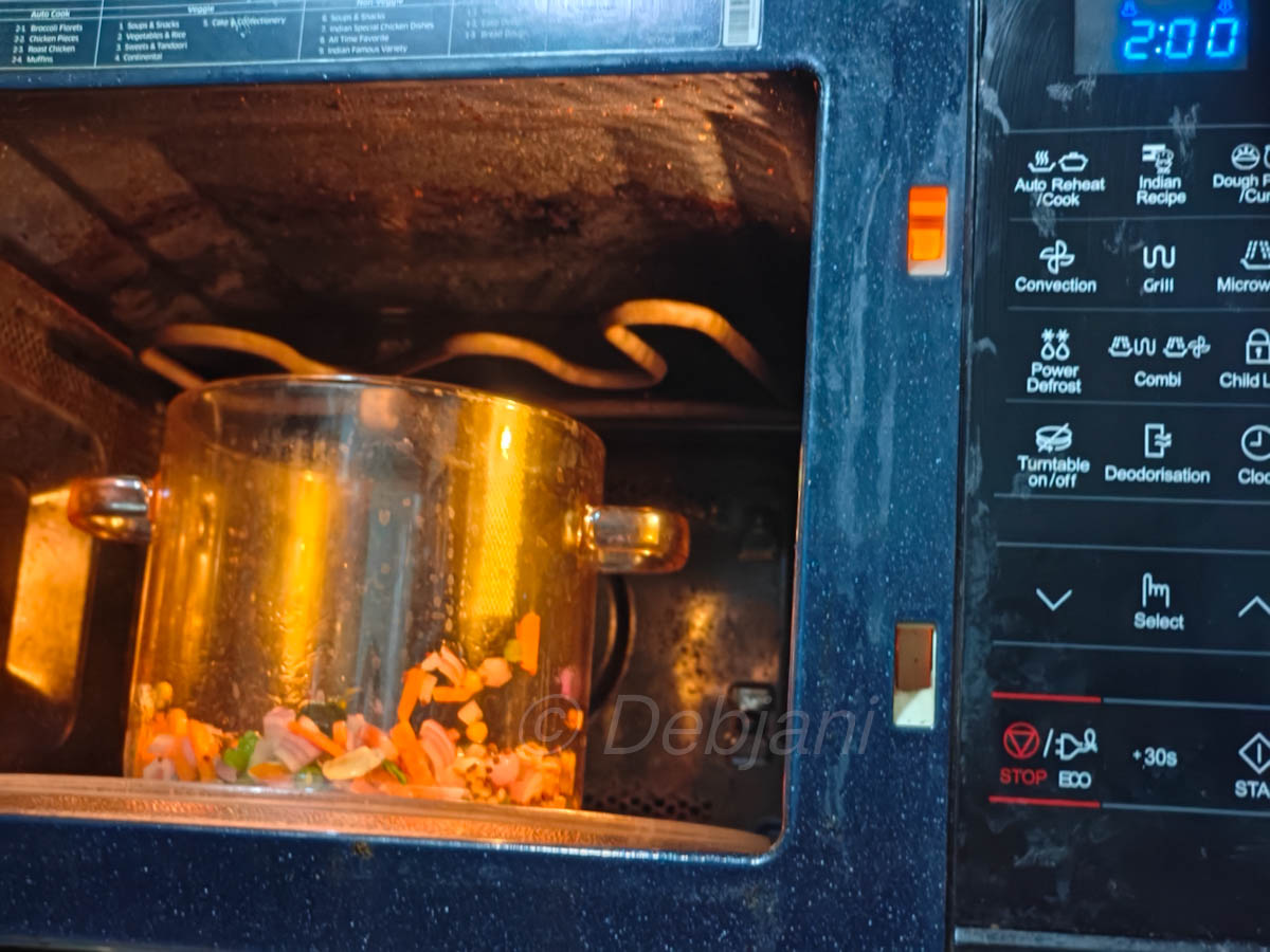 %cooking rava upma in a microwave recipe step debjanir rannaghar