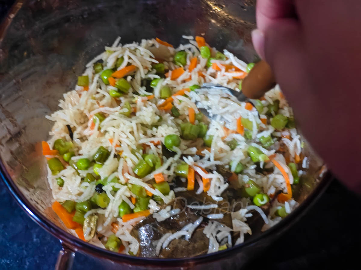 %how to cook vegetable pulao in a microwave recipe step debjanir rannaghar