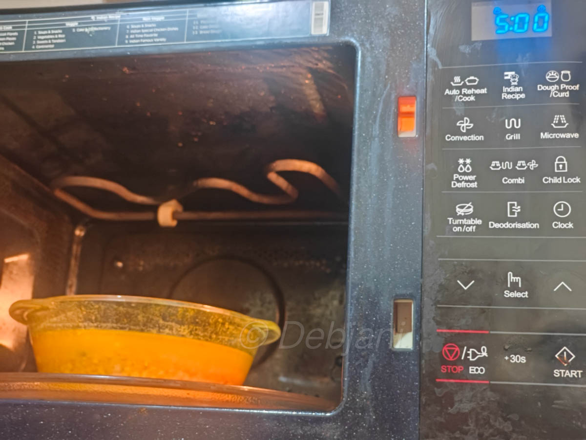 %cooking Bengali masoor dal siddho in microwave step