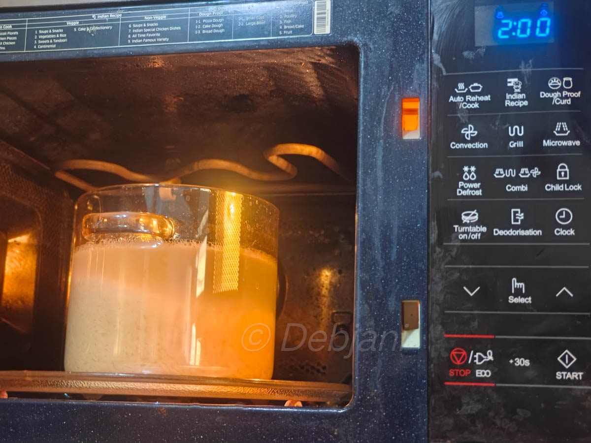 cooking seddho chaler bhat in microwave recipe step