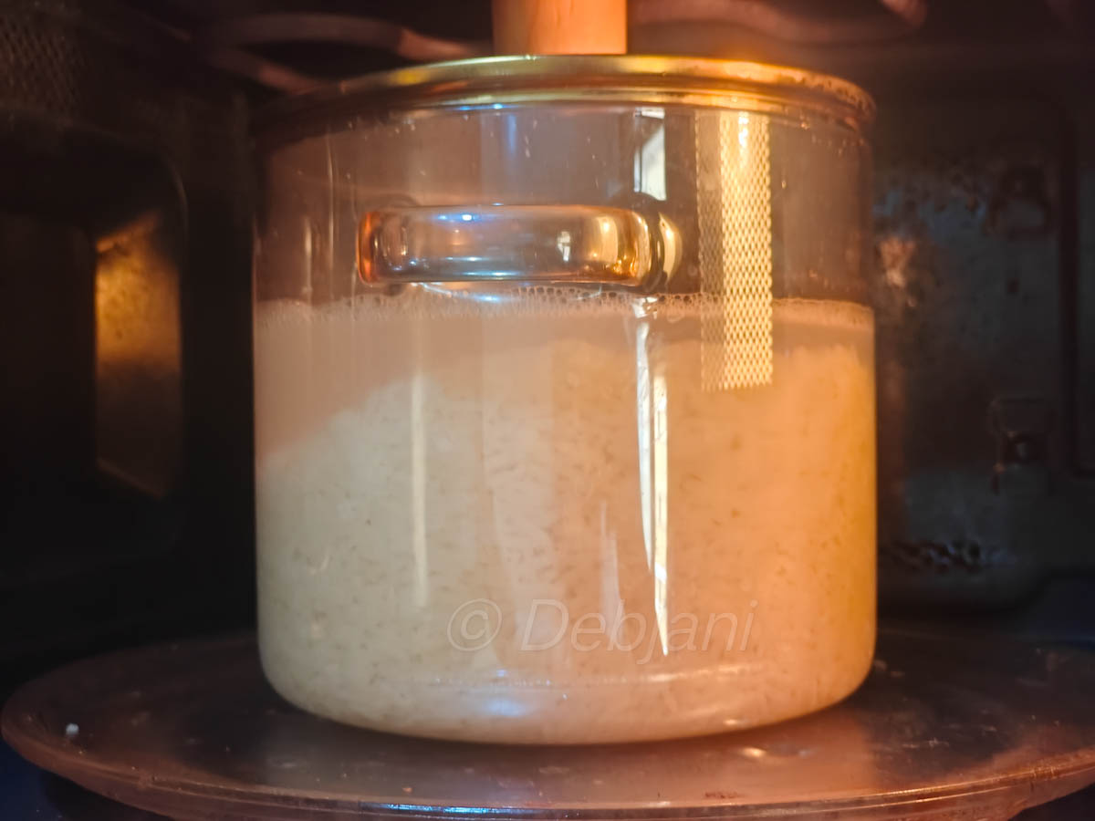 %cooking seddho chaler bhat in microwave recipe step