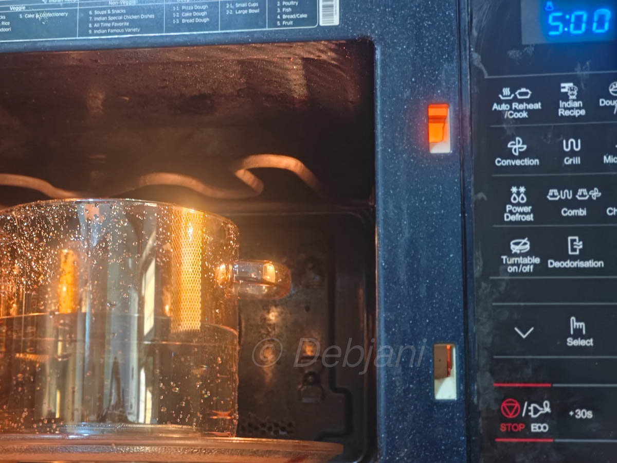 %cooking seddho chaler bhat in microwave recipe step